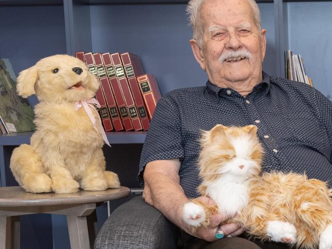 Story about a pilot program to introduce pets into aged care homes to reduce residents loneliness. Fronditha Care St Albans resident, John Gouvousis with Barney and some Interactive Companion Pets. Picture: Tony Gough