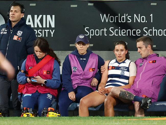 Bryde O'Rourke on the bench in her debut game. Picture: Michael Willson/AFL Photos via Getty Images.