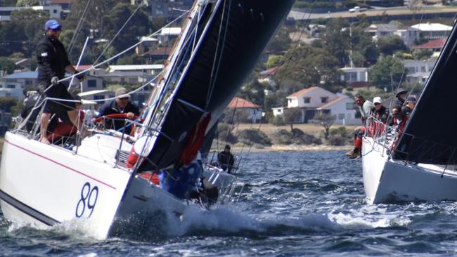 Midnight Rambler (left) had close racing with Whistler (Drew Latham) (right) in the Racing Keelboat Group of the Crown Series Bellerive Regatta. Picture Jane Austin