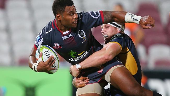 BRISBANE, AUSTRALIA - FEBRUARY 12: Samu Kerevi of the Reds is tackled by David Pocock of the Brumbies during the Super Rugby Pre-Season match between the Reds and the Brumbies at Ballymore Stadium on February 12, 2016 in Brisbane, Australia. (Photo by Chris Hyde/Getty Images)