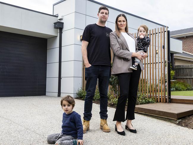 Celeste and Brad Andrews, pictured with their children Braxton and Cooper, built their home two years ago and have been devastated to have to sell it after their mortgage increased by $1000 a month. Picture: Aaron Francis