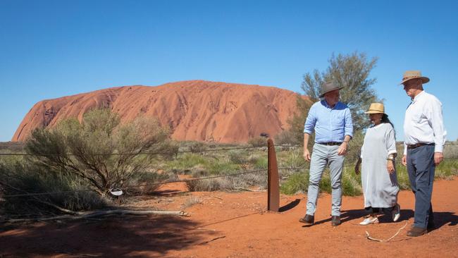 Anthony Albanese, left, Linda Burney and the federal member for Lingiari, Warren Snowdon, at Uluru.