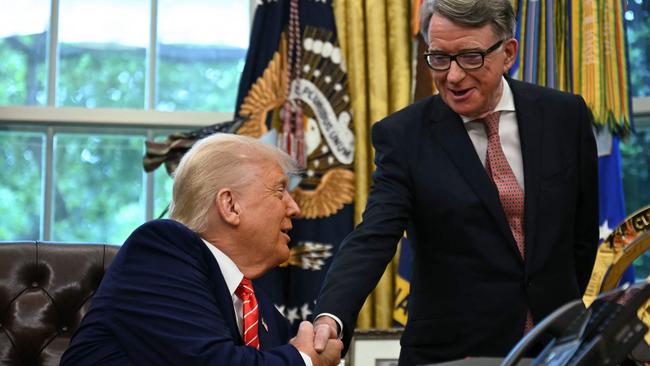 US President Donald Trump shakes hands with British ambassador to the United States Peter Mandelson. (Photo by Jim WATSON / AFP)