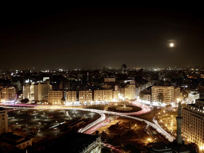 In this long exposure photograph, the Supermoon rises near Tahrir Square in Cairo, Egypt, Monday, Nov. 14, 2016. The brightest moon in almost 69 years lit up the sky, during its closest approach to earth as the "Supermoon" reached its most luminescent phase. The moon won't be this close again until Nov. 25, 2035. (AP Photo/Nariman El-Mofty)