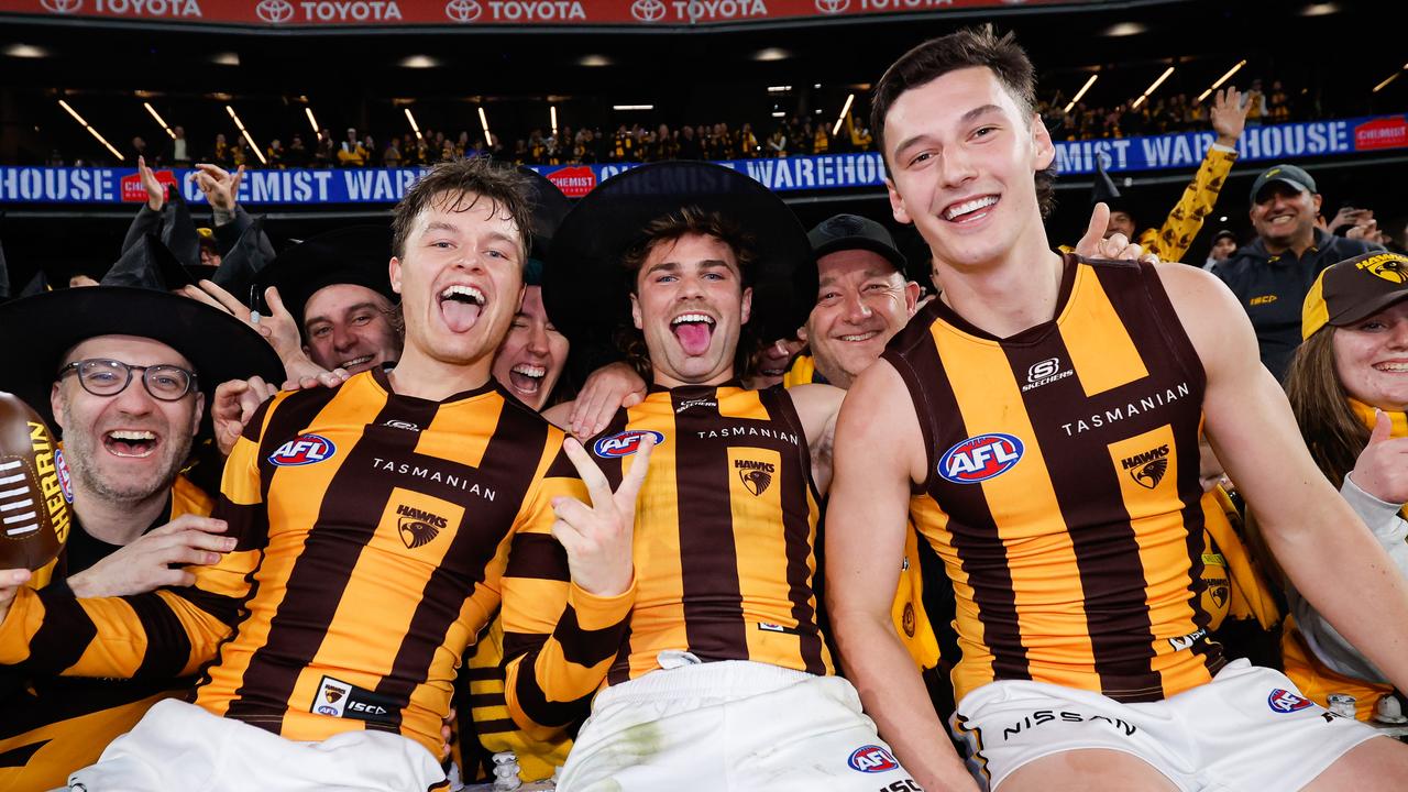 MELBOURNE, AUSTRALIA - SEPTEMBER 06: Jack Ginnivan, Nick Watson and Connor Macdonald of the Hawks pose for a photo during the 2024 AFL Second Elimination Final match between the Western Bulldogs and the Hawthorn Hawks at The Melbourne Cricket Ground on September 06, 2024 in Melbourne, Australia. (Photo by Dylan Burns/AFL Photos via Getty Images)