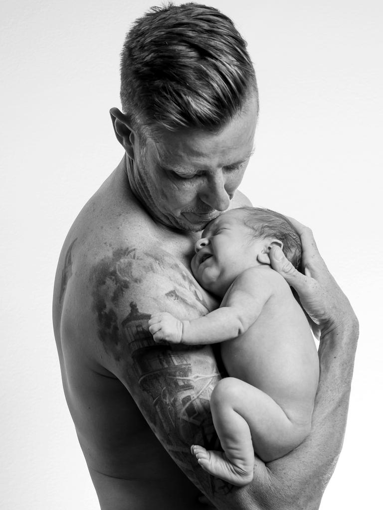 James Courtney and his son Kobe. Picture: Nigel Hallett