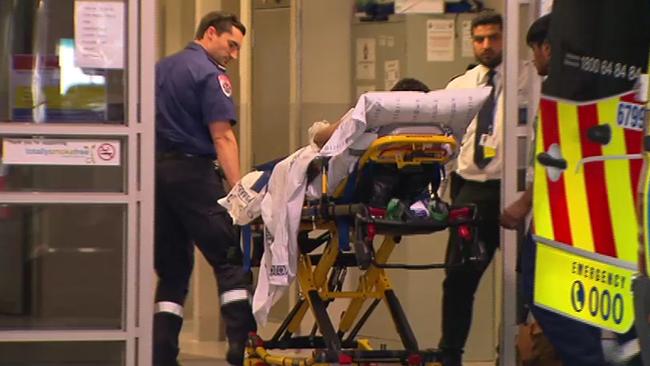 A man is taken from the scene by paramedics. Picture: Seven News