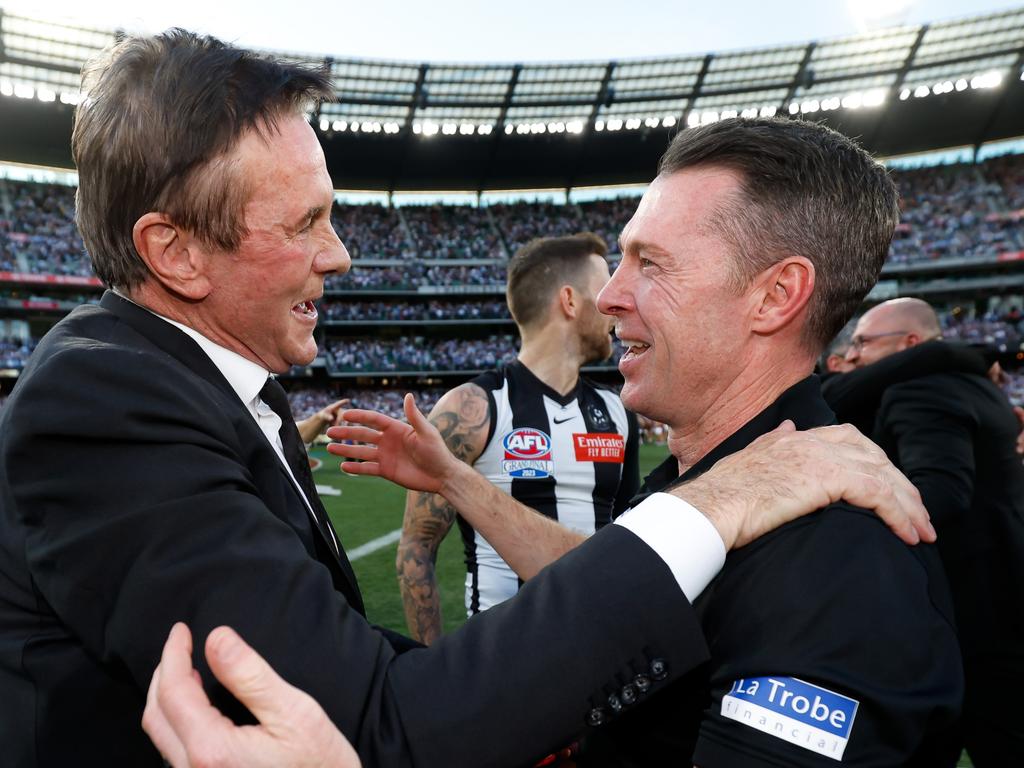 Jeff Browne and Craig McRae celebrate after the 2023 grand final. (Photo by Dylan Burns/AFL Photos via Getty Images)