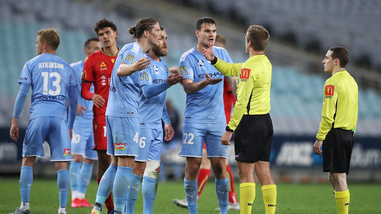 Adelaide United earned a 2-2 draw with a 10-man Melbourne City.