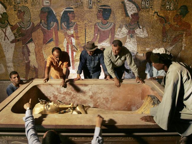 Egypt's antiquities chief Dr Zahi Hawass supervises the removal of King Tut from his underground tomb in 2007. Picture: AP