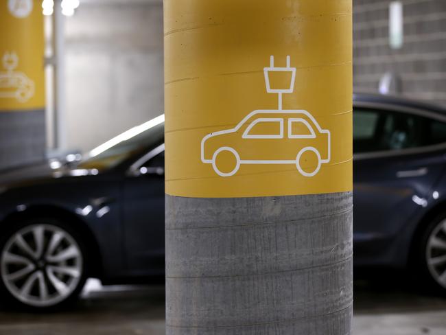 SYDNEY, AUSTRALIA - JANUARY 19: A Tesla Model Y charges at a EV charge station in Lane Cove on January 19, 2021 in Sydney, Australia. Share prices for lithium miners and battery makers continue to rise as global demand for electric vehicles continues to grow. Lithium is a key component for batteries in electric cars. (Photo by Brendon Thorne/Getty Images)