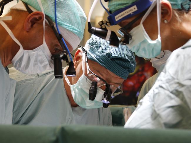 The Swedish team and Australian Associate Professor Ash Hanafy performing a womb transplant surgery.