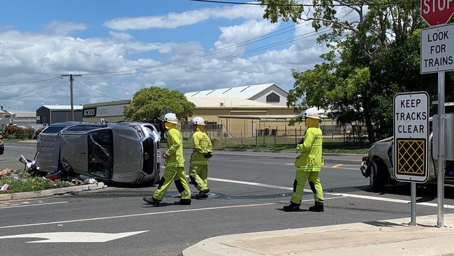 A car has flipped onto its side during a two-vehicle smash in Rockhampton's CBD on February 11. Photo Pam McKay.