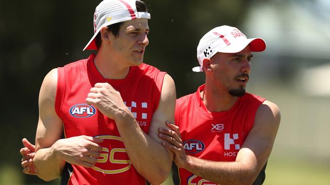 Gold Coast recruits Chris Burgess and Izak Rankine.