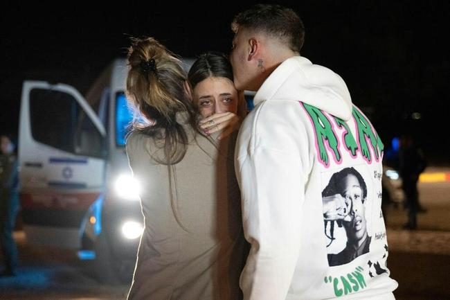 Former Franco-Israeli hostage Mia Shem greets her mother and brother following her release by Hamas