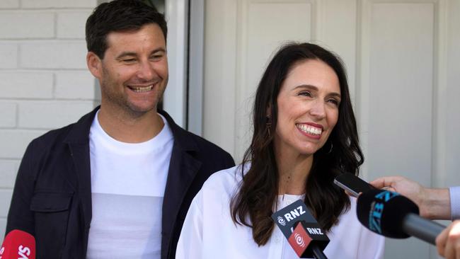 New Zealand Prime Minister Jacinda Ardern (R) and her partner Clarke Gayford.