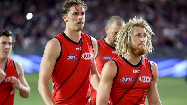 Dyson Heppell leads the losing Bombers off Perth Stadium. Picture: AAP