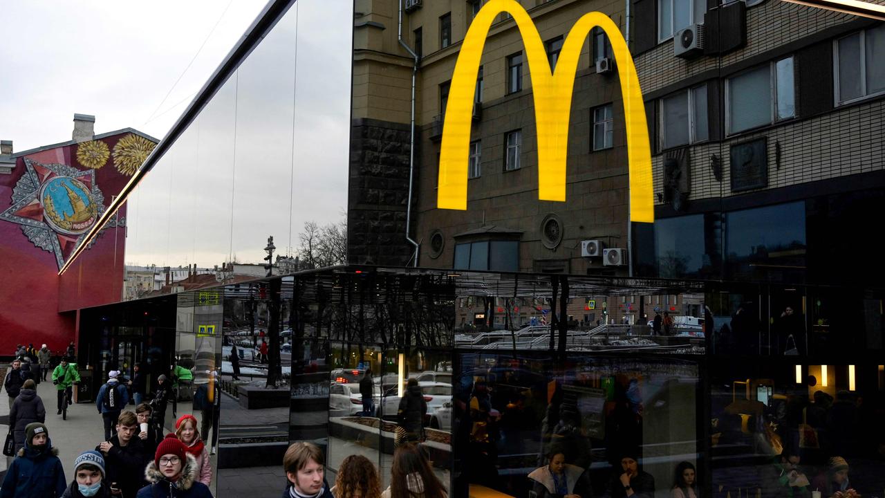 McDonald’s closing in Russia: Man chains himself to Moscow restaurant ...