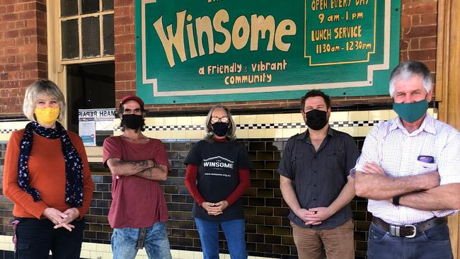 OUR PEOPLE: The Winsome Soup Kitchen manager Mieke Bell (far left) with patron Robert Cameron and volunteers Margot McKeon, Steve Smith and Mick Melino. Ms Bell said, "caring for our people through the Winsome is possible because of our wonderful volunteers." Photo: Alison Paterson