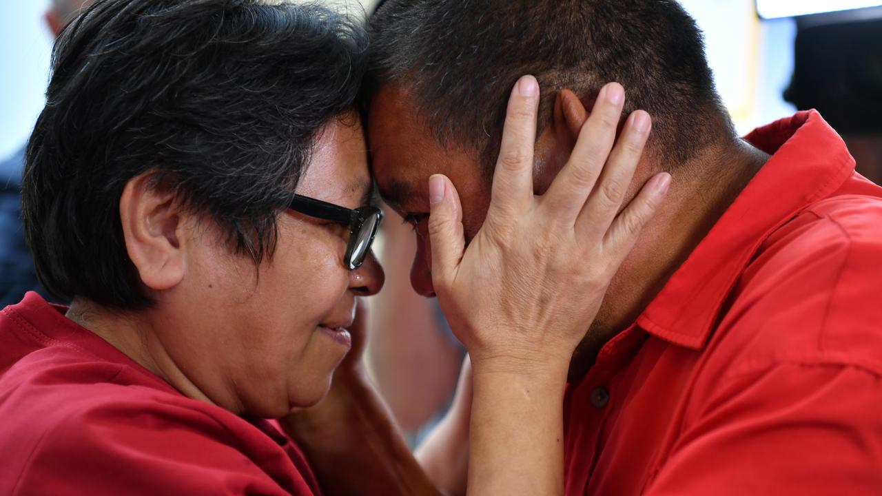 There have been joyous scenes of family reunions at Sydney international airport. Pictured is Maria Exposto reuniting with her brother John last Friday. Picture: Dean Lewins/AAP