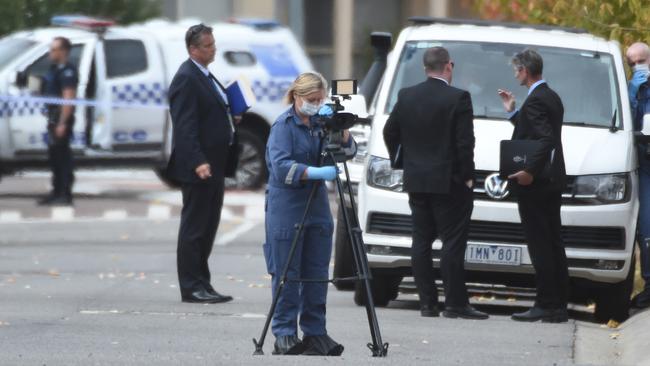 Forensics police and detectives are at the scene. Picture: Tony Gough