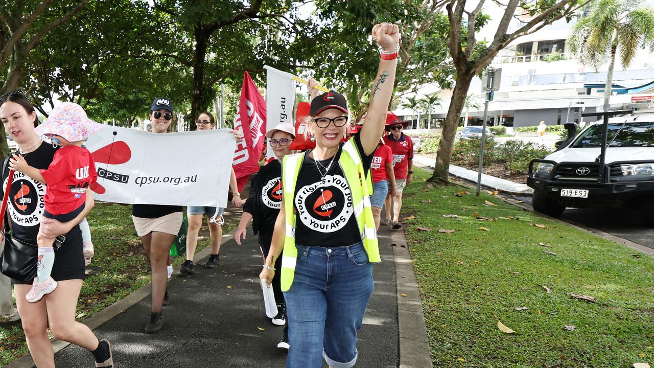 Community and Public Sector Union member Elida Faith participates in the annual Labour Day march on the Cairns Esplanade. Picture: Brendan Radke