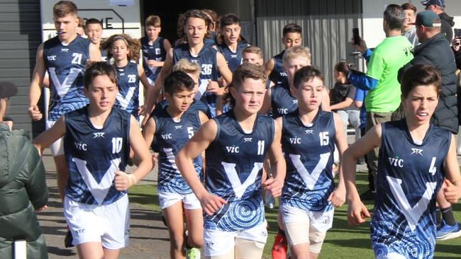 Victoria Schoolboys under-12 football team running out at Campbelltown Memorial Oval in Adelaide during their 2022 National Carnival. (Supplied)