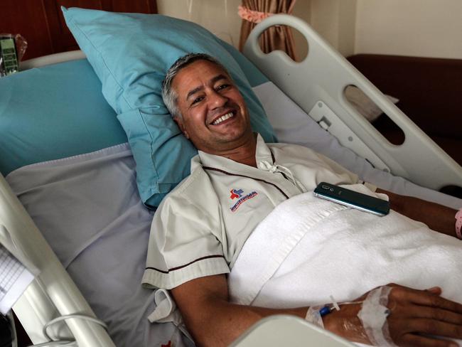 Italian tourist Andrea Tazzioli, 51, who was injured during the bomb attack in Salakam road, smiles for a photograph on his bed at Sanpaulo hospital. Picture: Getty