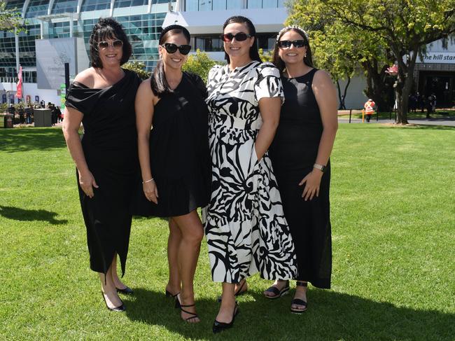 Guests in striking racewear at Penfolds Derby Day at the Flemington Racecourse on Saturday, November 02, 2024: Sonia Gageler, Amelia Gageler, Maddison Chandler and McKenzie Gageler. Picture: Jack Colantuono