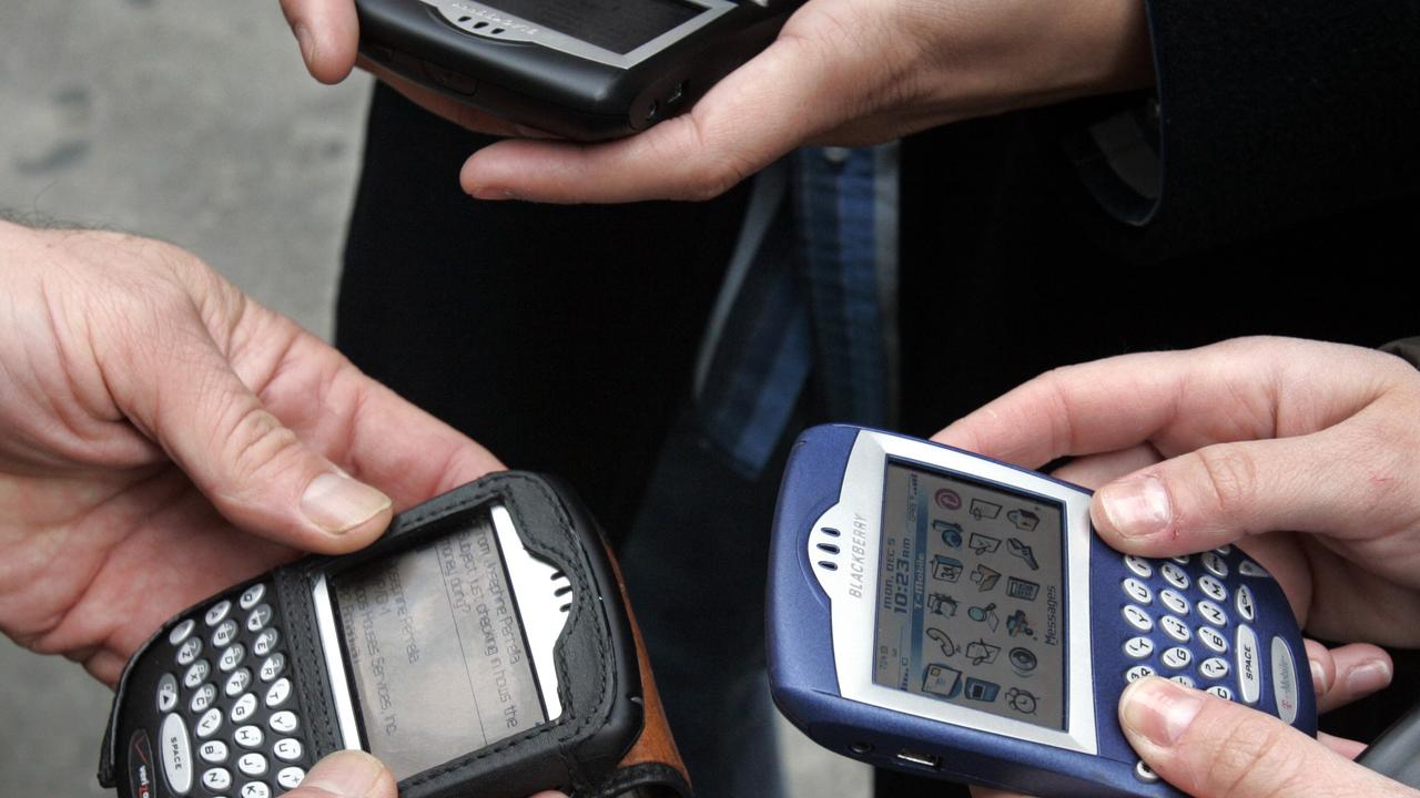 The phones were popular among high flying business execs for their security and ability to send emails before other phones were able to. Picture: Richard Drew/AP