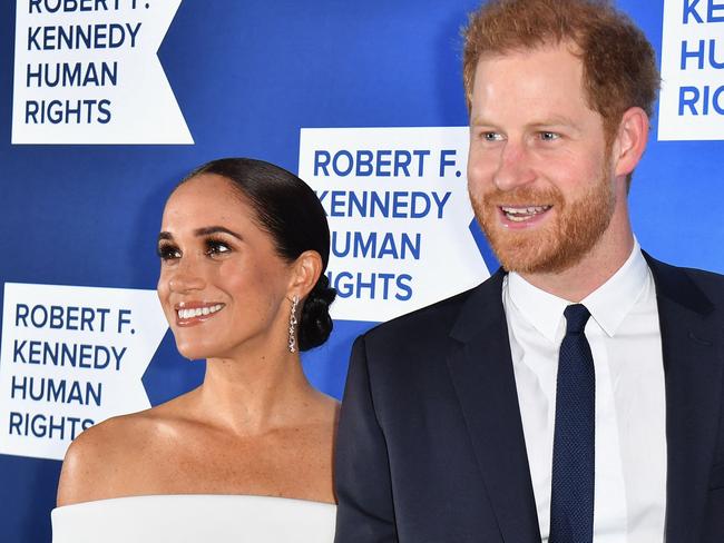 A decision to unseal immigration records could have implications for the status of Prince Harry, pictured with wife Meghan Markle, in the US. Picture: AFP