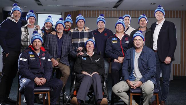 Neale Daniher with a bunch of his old players, including (back row L-R) Anthony Ingerson, Matthew Collins, Matthew Whelan, Rod Grinter, Nathan Brown, Daniel Ward, Guy Rigoni, Brad Green, Chris Johnson, Travis Johnstone and Alistair Nicholson, (seated) Nathan Jones and Garry Lyon. Picture: Michael Klein