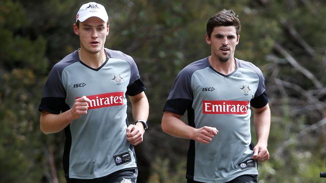 Scott Pendlebury runs alongside young gun Darcy Moore during the Falls Creek training camp. Picture: Michael Klein