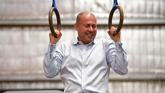 Treasurer Josh Frydenberg works up a sweat on a visit to RB Robson Stadium at Wallan, Victoria. Picture: AAP