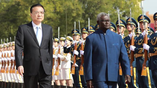 Chinese Premier Li Keqiang holds a welcoming ceremony for Solomon Islands Prime Minister Manasseh Sogavare in Beijing in 2019. Picture: AFP