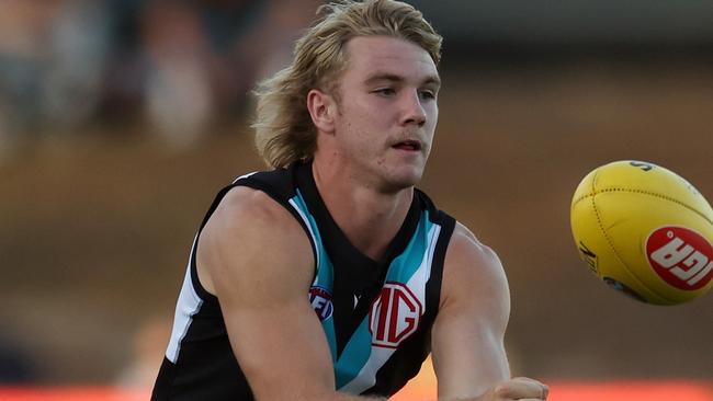 PERTH, AUSTRALIA - FEBRUARY 24: Jason Horne-Francis of the Power handpasses the ball during the 2023 AFL match simulation between the West Coast Eagles and the Port Adelaide Power at Mineral Resources Park on February 24, 2023 in Perth, Australia. (Photo by Will Russell/AFL Photos via Getty Images)