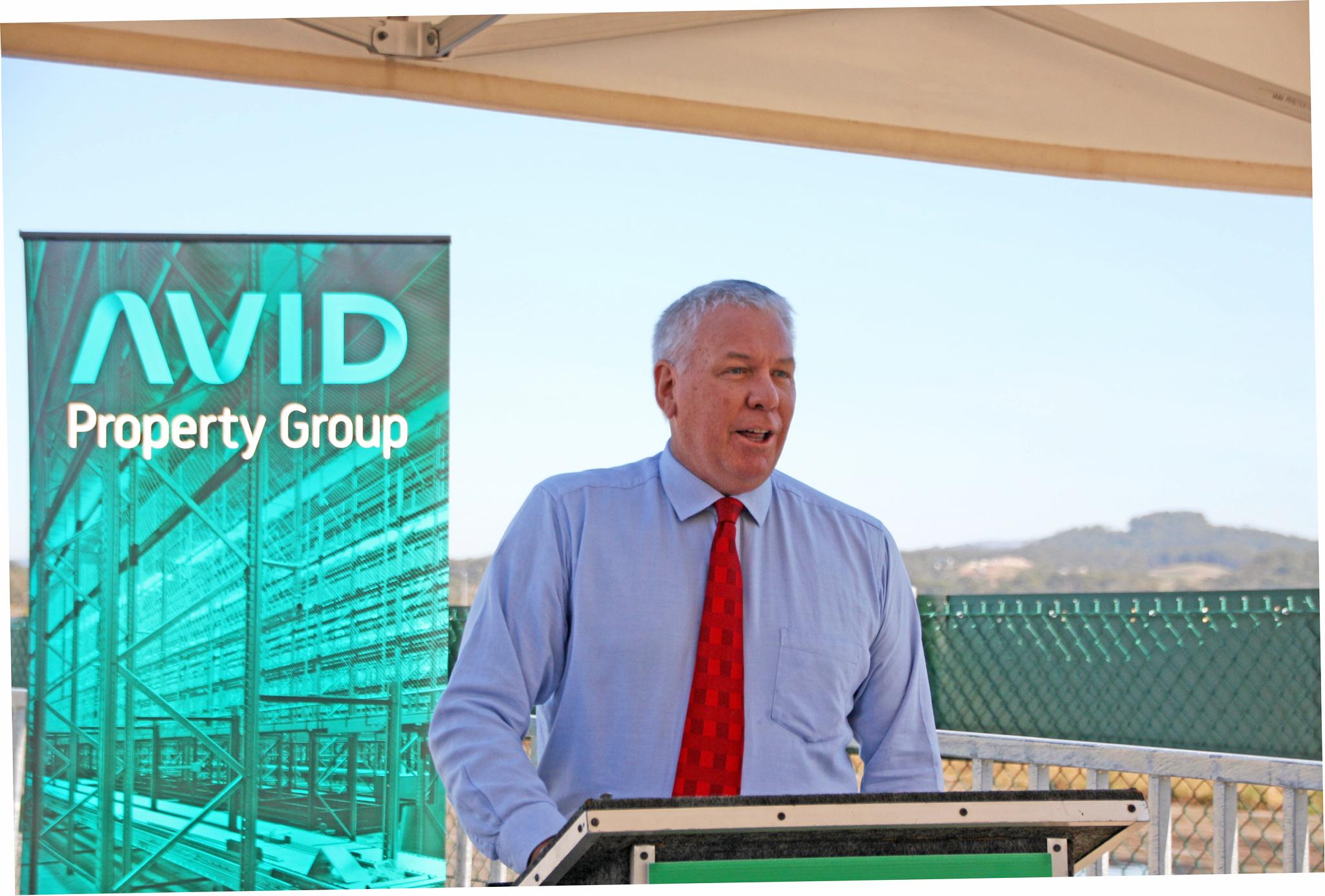 AVID Property Group general manager Bruce Harper speaks at the official opening of Peter Crosby Way, the gateway to Palmview's largest master-planned community, Harmony. Picture: Erle Levey