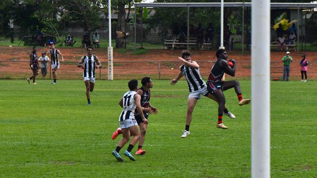 Images from the Round 9 NTFL MPL/WPL clash between the Tiwi Bombers and Palmerston Magpies at Bathurst Island, 30 November 2024. Picture: Darcy Jennings