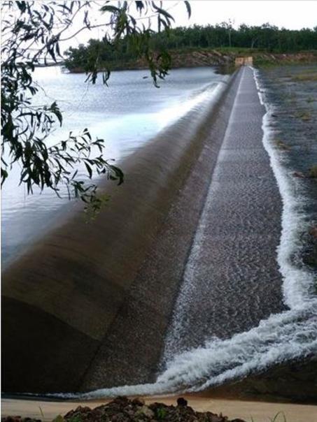 Darwin River Dam is now overflowing and  residents downstream from the dam are being warned to prepare for flooding. Picture: Power and Water/Facebook