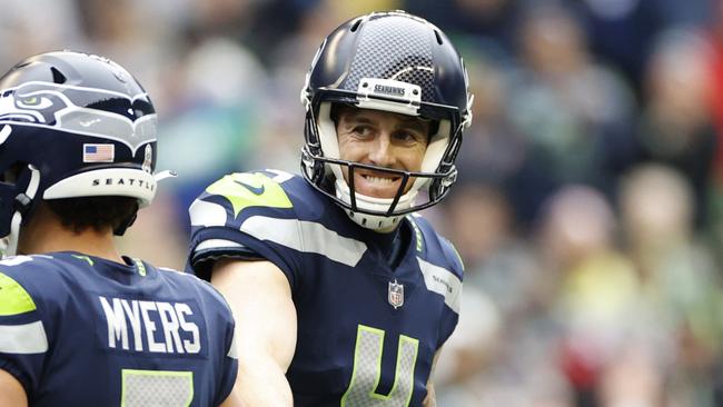 SEATTLE, WASHINGTON - OCTOBER 30: Michael Dickson #4 of the Seattle Seahawks celebrate a field goal with Jason Myers #5 of the Seattle Seahawks against the New York Giants during the second quarter at Lumen Field on October 30, 2022 in Seattle, Washington. (Photo by Steph Chambers/Getty Images)