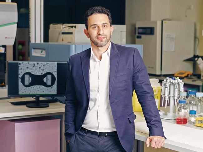 Associate Professor Enzo Porrello, Melbourne Node Director, Novo Nordisk Foundation Center for Stem Cell Medicine, reNEW pictured with an image of live heart tissue. Photo by Josh Robenstone