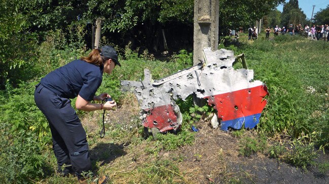 Australian Federal Police working side-by-side with international counterparts as members of the MH17 Joint Investigation Team (JIT). The JIT included representatives from Australia, the Netherlands, Ukraine, Belgium and Malaysia. Picture: Supplied.