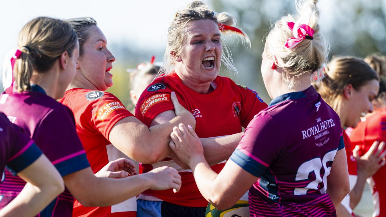 Courtney Jackson of St George Roma shows attitude to her sister Kayla Jackson of Toowoomba Bears after scoring a try in Downs Rugby Womens XV grand final rugby union at Toowoomba Sports Ground, Saturday, August 24, 2024. Picture: Kevin Farmer