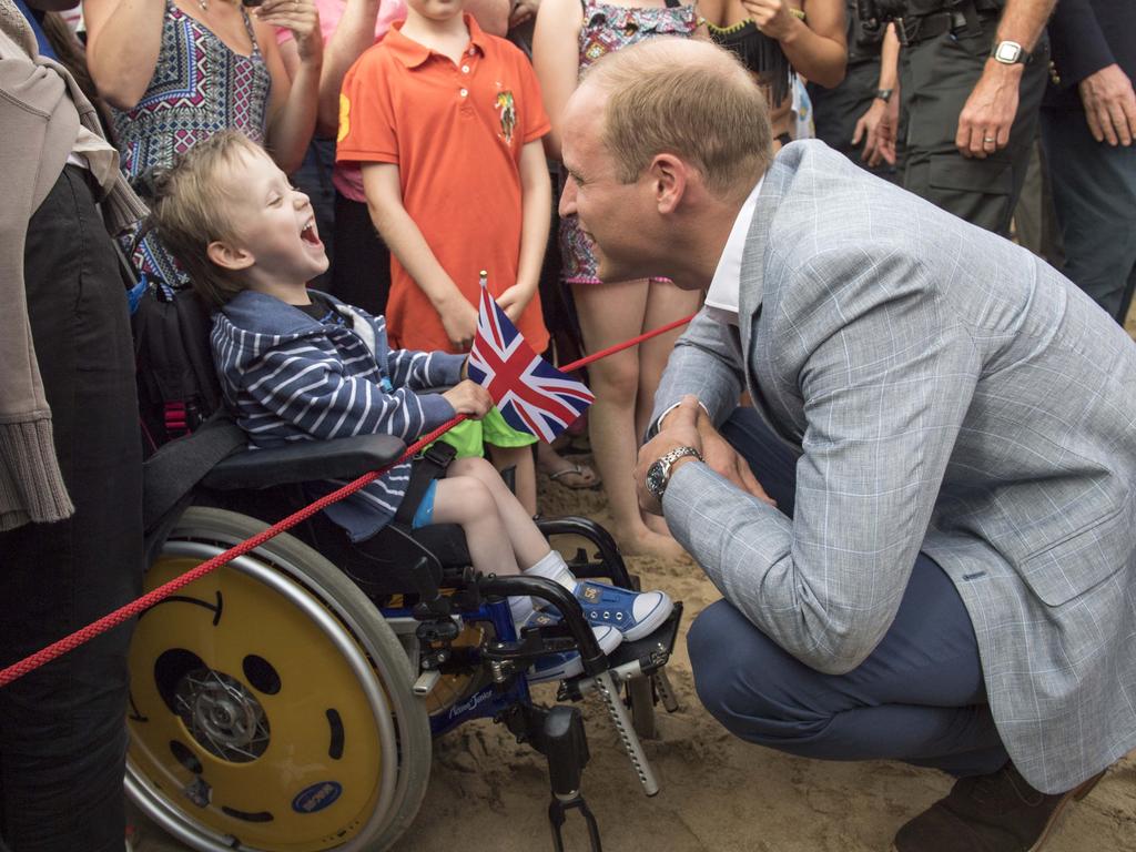 Prince William, Duke of Cambridge meets Jaydon Mitchell-Tomlinson, 5, who suffers from cerebal palsey as he visits the work of the Wave Project on Newquay’s Towan Beach, an organisation that uses surfing as a tool to reduce anxiety in children and improve their mental wellbeing on September 1, 2016 in Newquay, United Kingdom. Picture: Getty