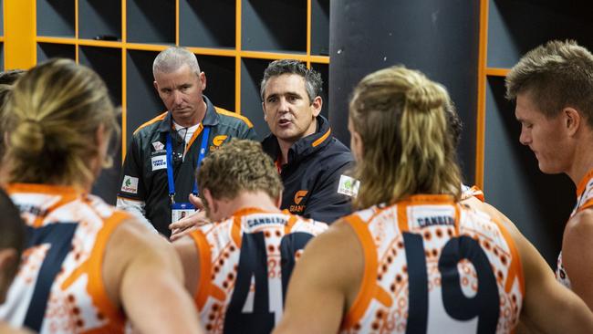 GWS coach Leon Cameron addresses his men as Robertson watches on. Pic: @GWSGIANTS