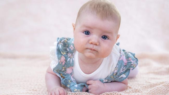 Four-month-old Matilda Trescowthick hasn’t met her extended family yet – but she and her mother Kate fly to SA on Thursday for the special moment. Picture: Wayne Taylor