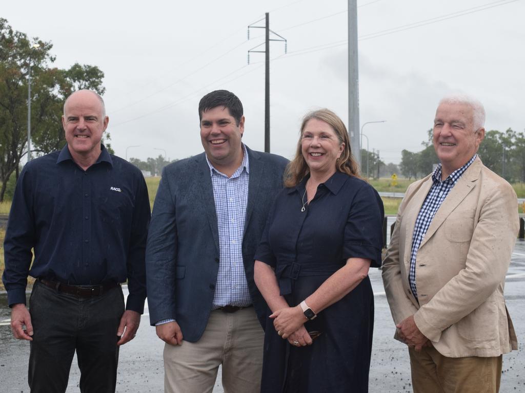 RACQ Managing Director and Group Chief Executive Officer David Carter, Qld Transport and Main Roads Brent Mickelberg, Federal Infrastructure, Transport, Regional Development and Local Government Minister Catherine King and Queensland Trucking Association CEO Gary Mahon next to the Bruce Highway at Midgee on March 19, 2025.