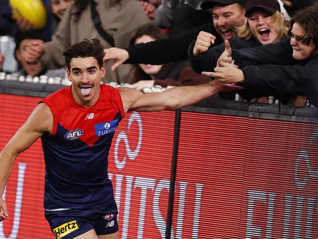 MELBOURNE. 23/06/2022..   AFL Round 15 .  Melbourne vs Brisbane at the MCG.  Toby Bedford of the Demons celebrates a 2nd quarter goal with the fans  . Photo by Michael Klein