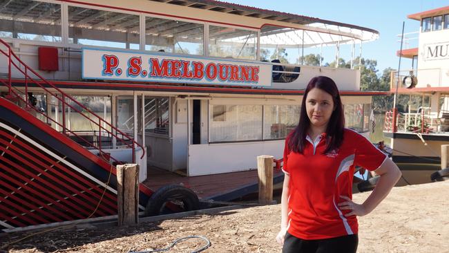 Mildura Paddle Steamers marketing manager Ashton Kreuzer in front of the P.S. Melbourne.