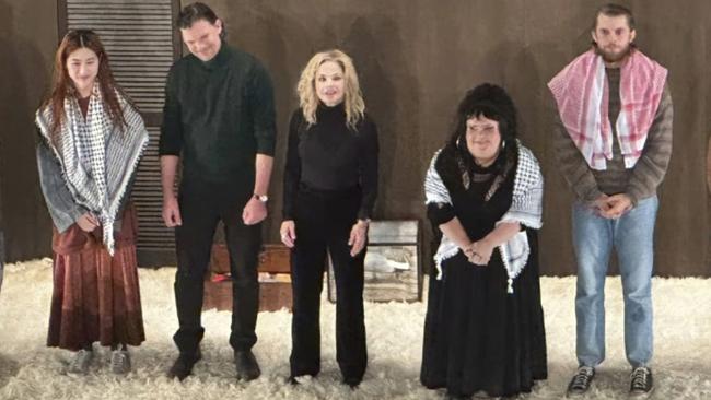 Harry Greenwood, right along with co-stars Megan Wilding, second from right, and Mabel Li, left, wore keffiyeh scarfs during the encore at the opening night of the STC production of The Seagull at Sydney’s Roslyn Packer Theatre. Picture: Instagram